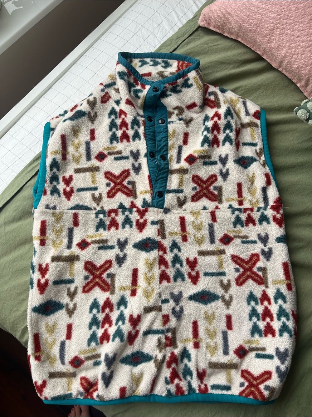 Cream Patterned Fleece Vest with Teal Trim